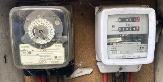 An old style time-switch and dual rate electricity meter